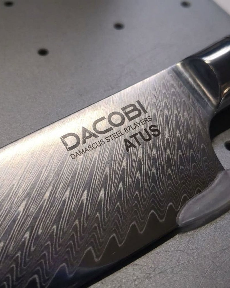Personalised Christmas gifts, a name laser engraved on the damascus blade of a DACOBI knife
