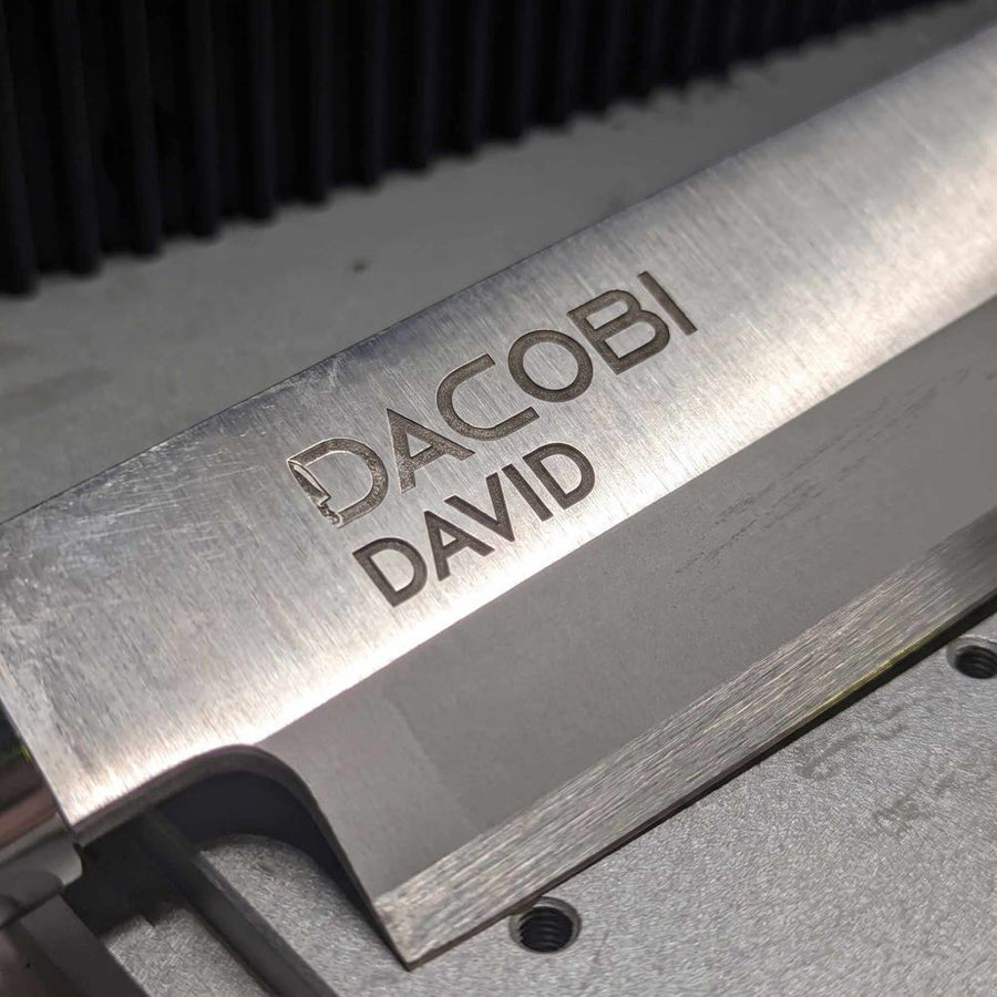 DACOBI knife with the name DAVID laser-engraved under the logo