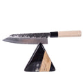 Professional Tsuchime Kiritsuke knife on a stand